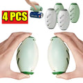 Pet hair remover roller ball 4-pack held in two hands, green and white