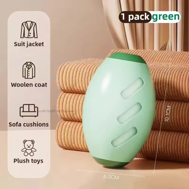 Pet hair remover ball rinsed under water to restore stickiness